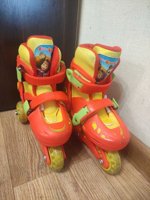 Роликовые коньки