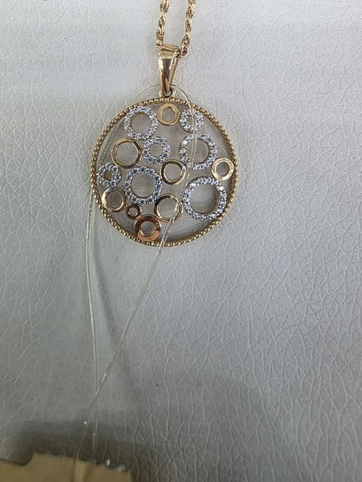 Продам золотые кулоны.