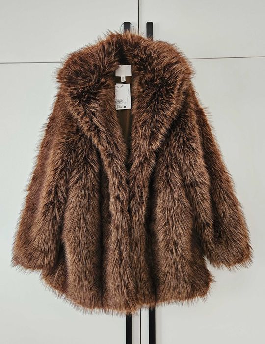 Луксозно уголемено палто на Нм. Ново с етикет.