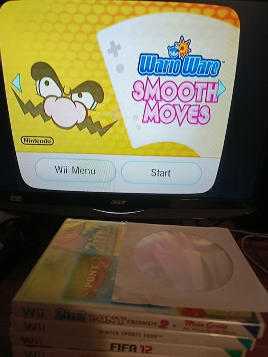 Consola Nintendo Wii + accesorii + jocuri