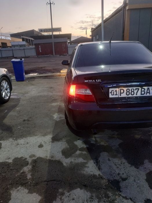 Nexia 2 1.6dons  qora moshina tayor