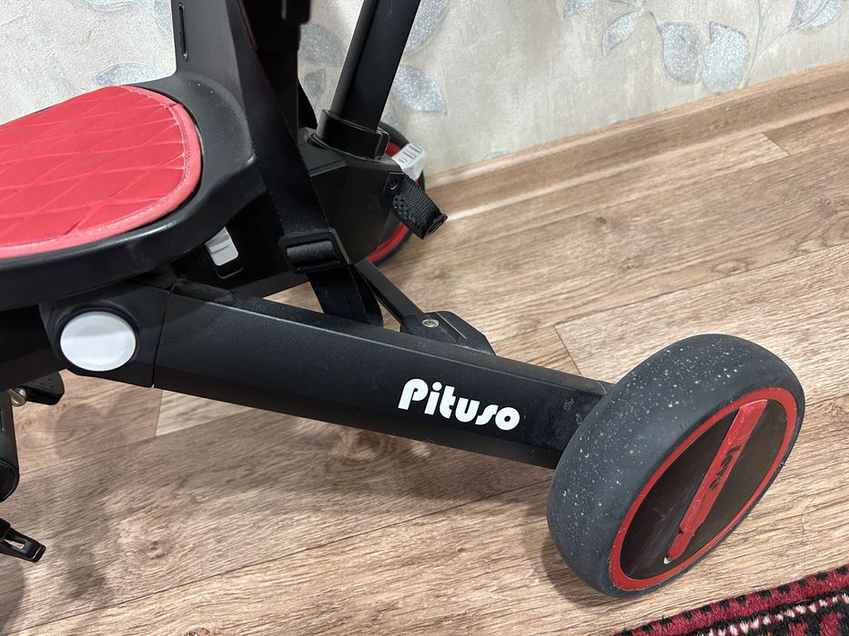 Трехколесный велосипед.