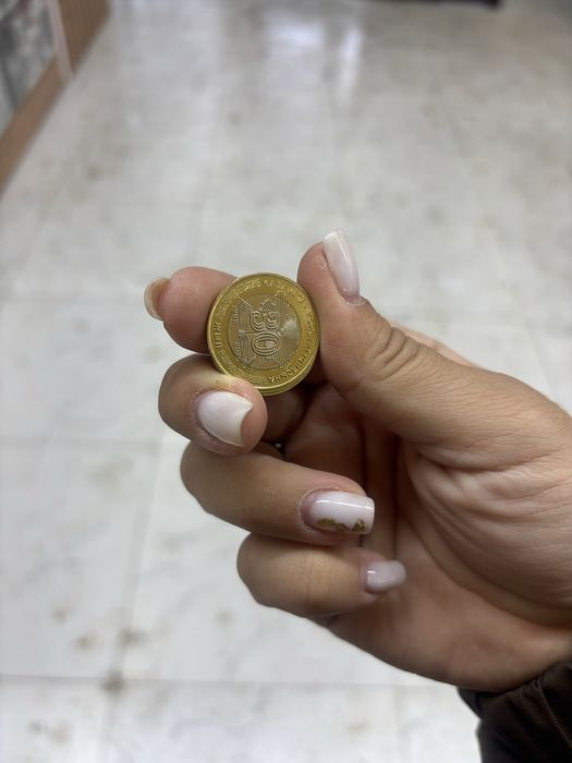 Монета 100тг коллекционный