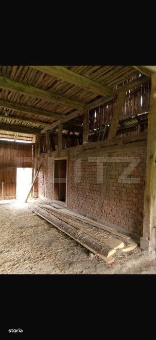 Casa cu 3 camere si un teren de 3000 mp, zona Cuzaplac