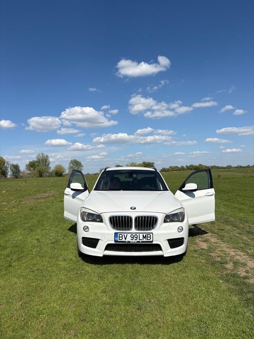 BMW X1 2011 — imagine 1