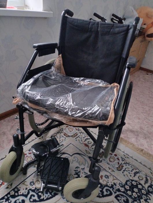 Инвалидное кресло