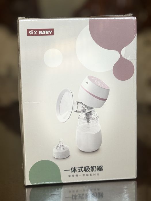 Электрический молокоотсос