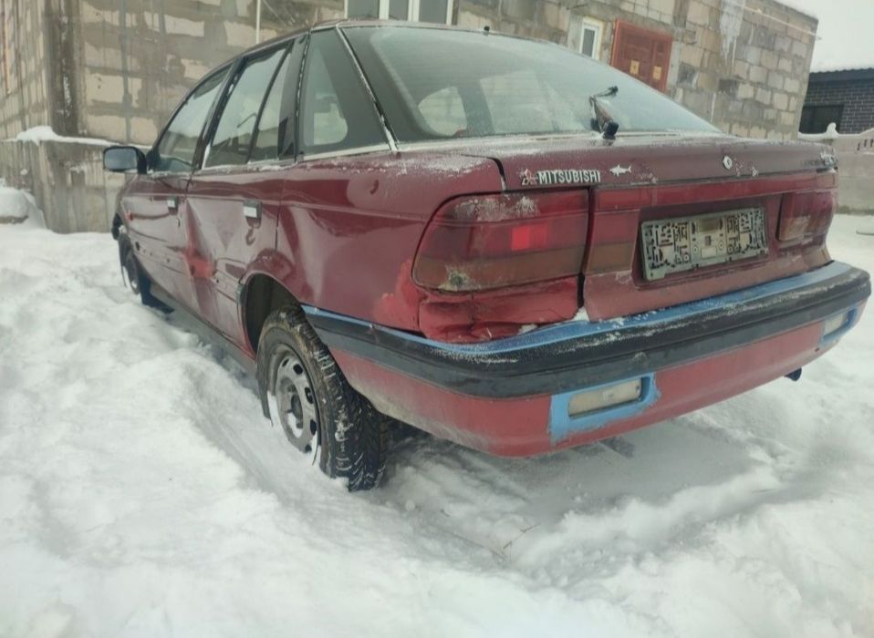 Продам Митсубиси Лансер по запчастям