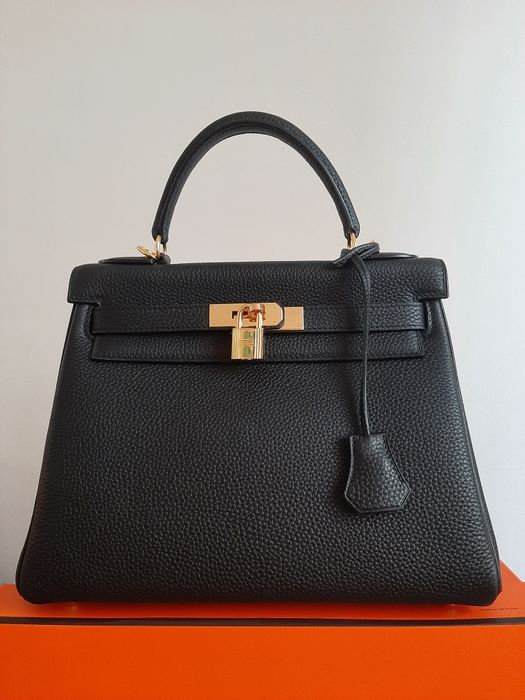 Сумка на ремне и с ручкой