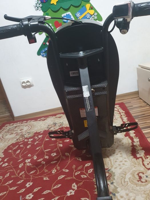 Tricicleta electrica încă în garanție