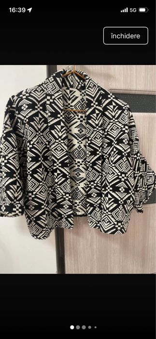 Blaizer marime universala, scurt in talie , fara nasturi, materioal  Ok, nici gros nici subtire, maneci 3/1