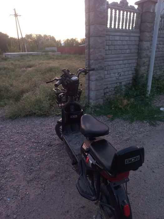 Электроскутер на ходу