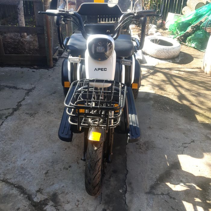 Triciclu electric.