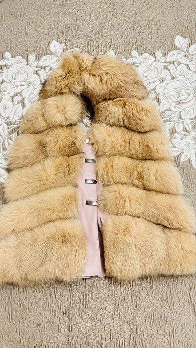 Продам жилетку меховую