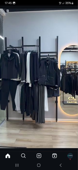 Стеллажи для магазинов одежды от бренда вешалки рейлы ветрина