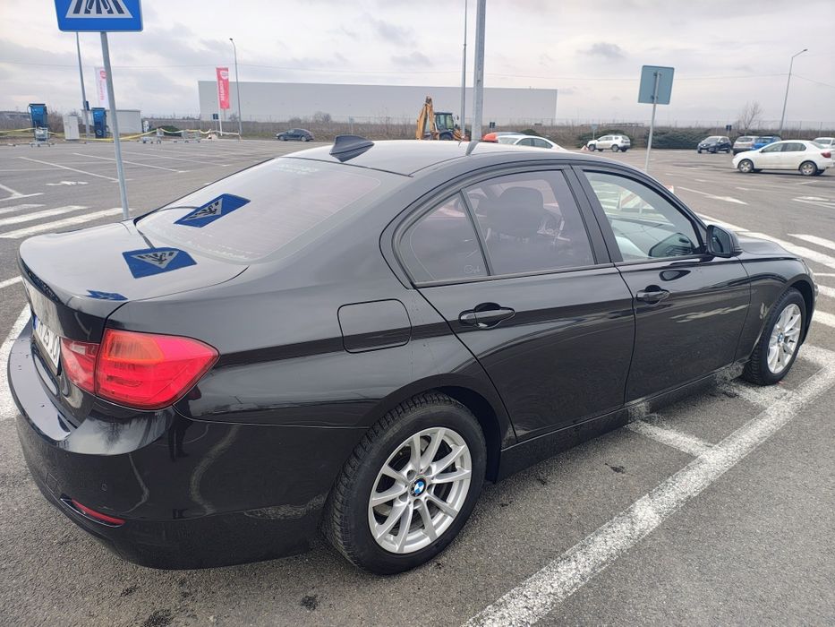 BMW 320i an 2012 184hp