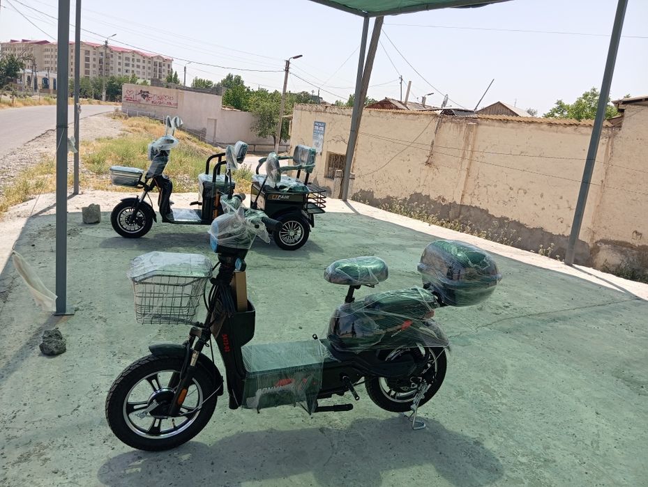 Скутр кваадрацикал