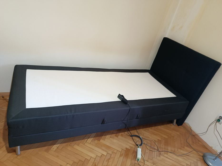 Pat de o persoană cu reglaj electric
