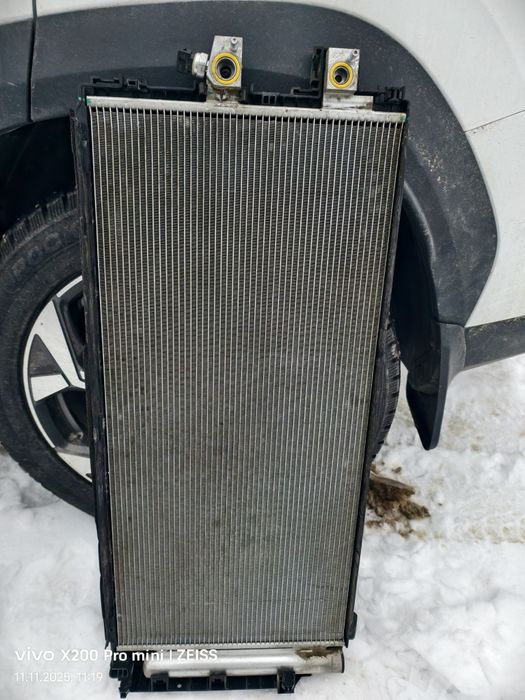 Радиатор от geely atlas fx11