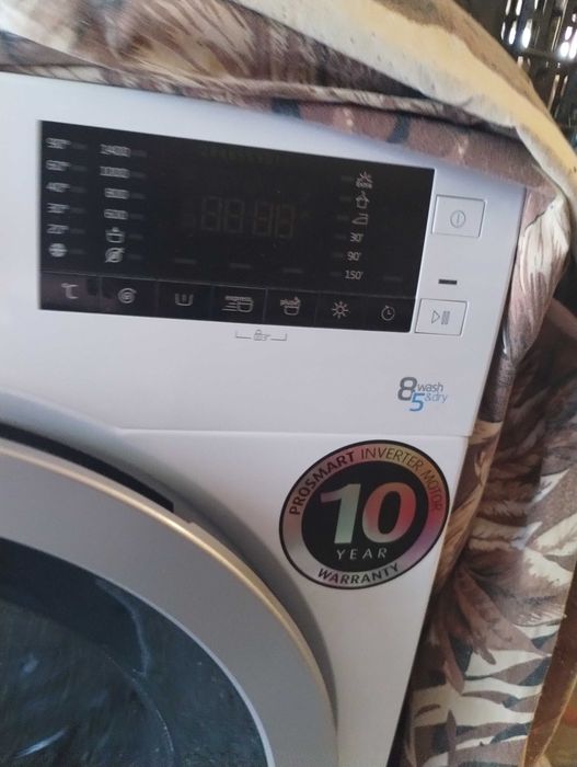 Продавам пералня със сушилня Beko