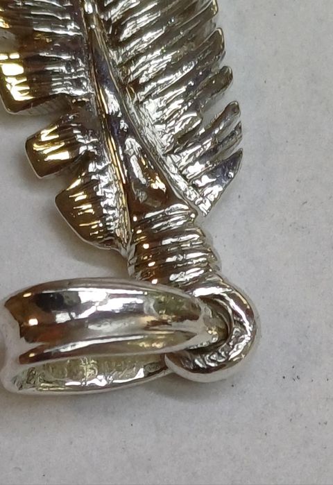 Сребърно авторско перо.