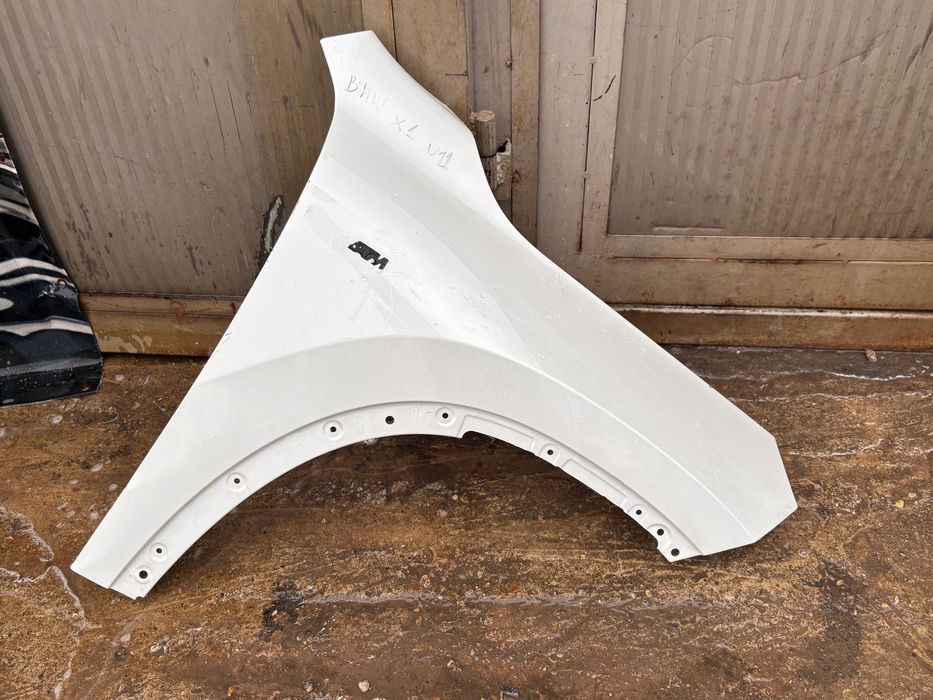 Калник преден десен • BMW X1 U11 •