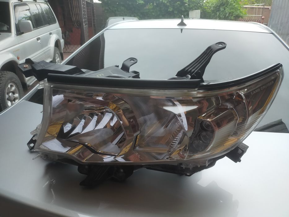 Фара Лан Крузер Прадо левая