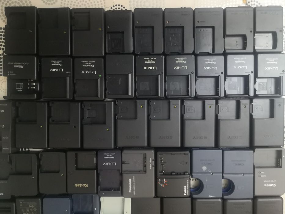 Canon. Sony. Casio. Nikon. Sanio. Olimpus. Kodak. Зарядки  для батарей