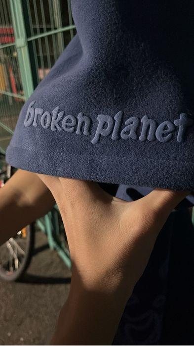 Broken planet zip blue