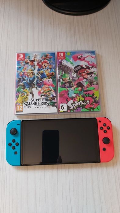 Consola Nintendo Switch OLED - pachet complet + 2 jocuri la alegere