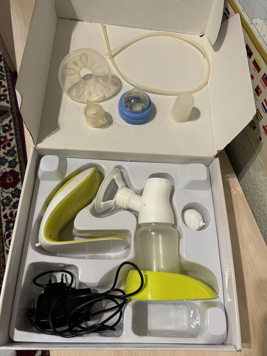 Электрический молокоотсос