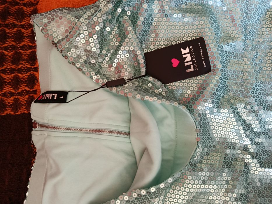 Верхняя женская одежда.