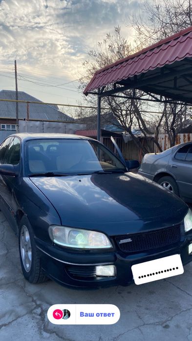 машина Опел омега б