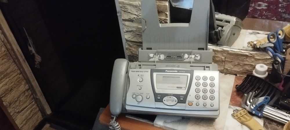 Факс  Panasonic  в рабочем состоянии