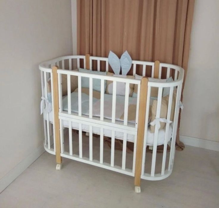 Кроватка трансформер с маятником