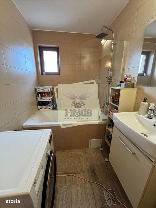 Apartament  decomandat cu 3 camere 2 bai de 105 mp utili