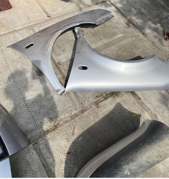 Aripa stanga Golf 5-2006