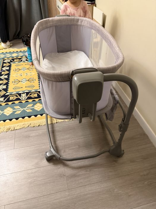 Манеж-качалка электрическая