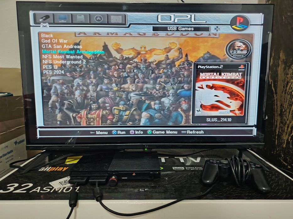 PlayStation 2 PS2 chip qilingan, 2 pult, o‘yinlar bilan o'ynashga tayy