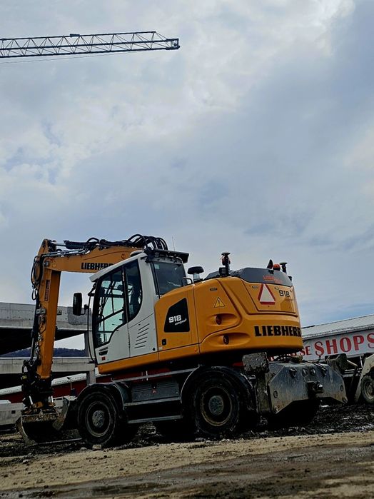 Inchiriere excavator pe pneuri