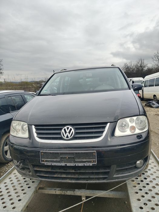 Piese motor cutie capota bara punte jug scaune faruri stopuri cârlig modul planșa trager radiatoare fuzeta modul caseta direcție  vw Touran 2.0tdi bmm