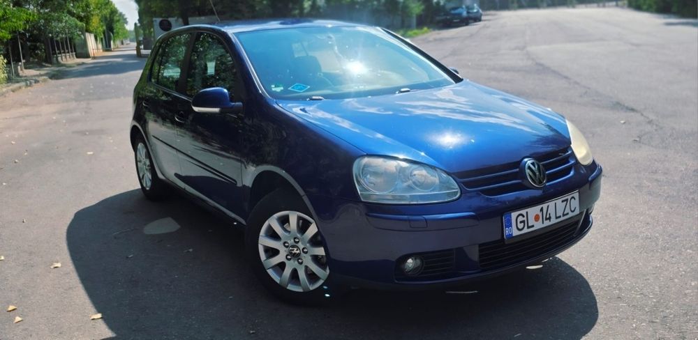 VW Golf 5 Tour 2007 1.6 benzina cu GPL AC 101 cai