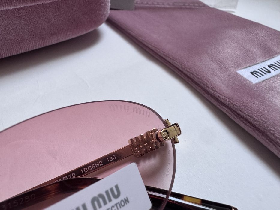 Ochelari de soare Miu Miu Oval-Rimless SMUA54 51-20 140, Noi
