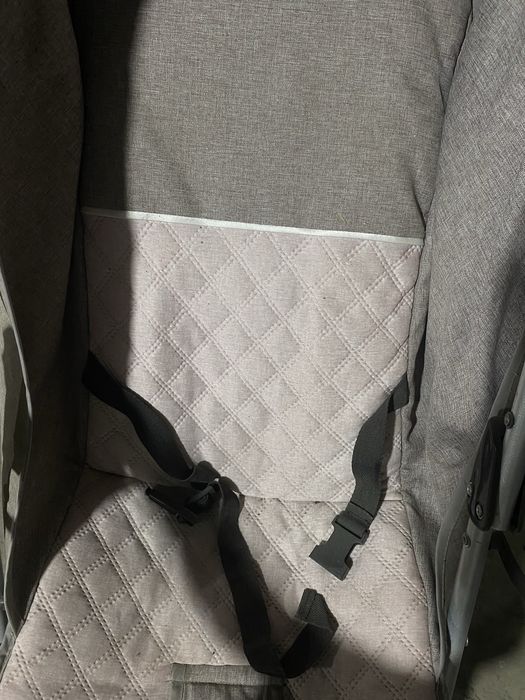 Детская коляска , серого цвета