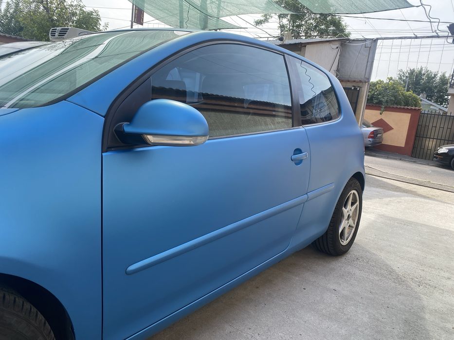 Volkswagen Golf 5 (2 usi) colantat