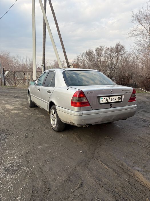 Мерседес C200 w202