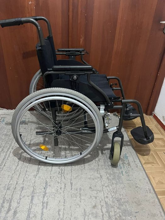 Инвалидная коляска