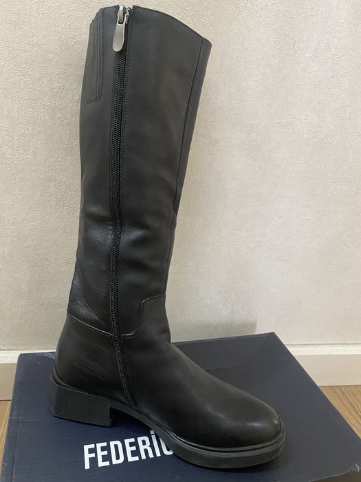 Продам сапоги новые