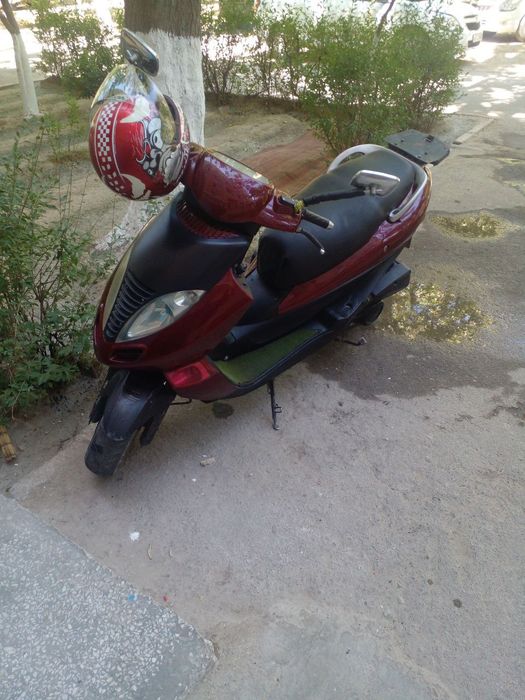 Продается скутер  Kymco bet&win 150
водное охлаждения
Объем цил