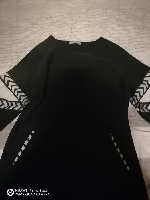 Интересна  рокля